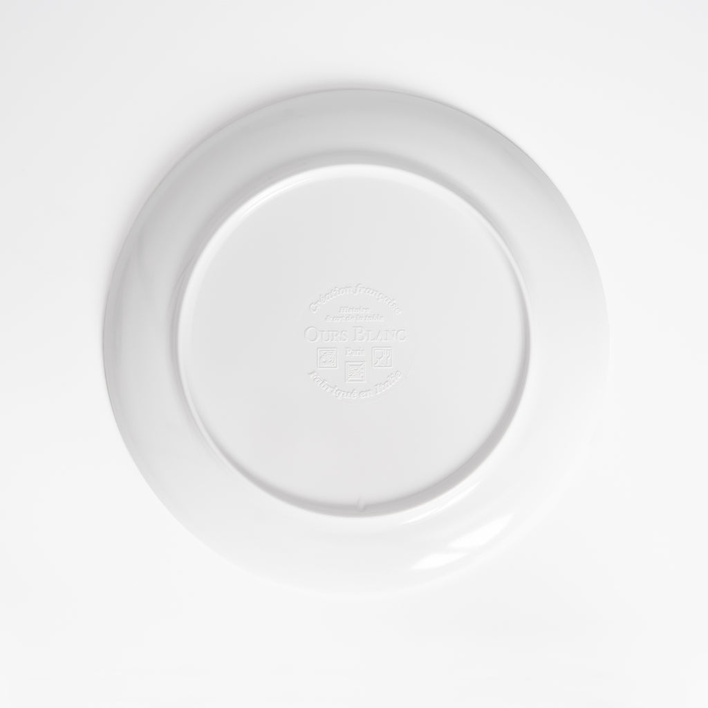 Dos d'une assiette en mélamine Ours Blanc Paris : illustration signée et surface vitrifiée