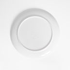 Dos d'une assiette en mélamine Ours Blanc Paris : illustration signée et surface vitrifiée